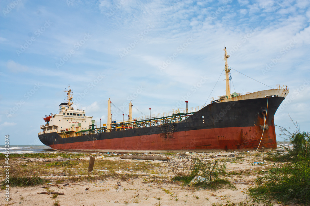 Oil Tanker Ship on dirty the beach Oil Tanker Ship on dirty the beach