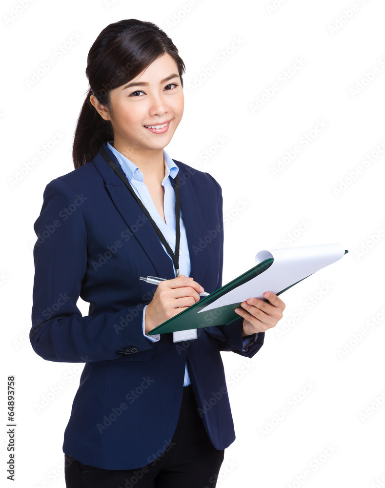 Businesswoman record on clipboard Businesswoman record on clipboard