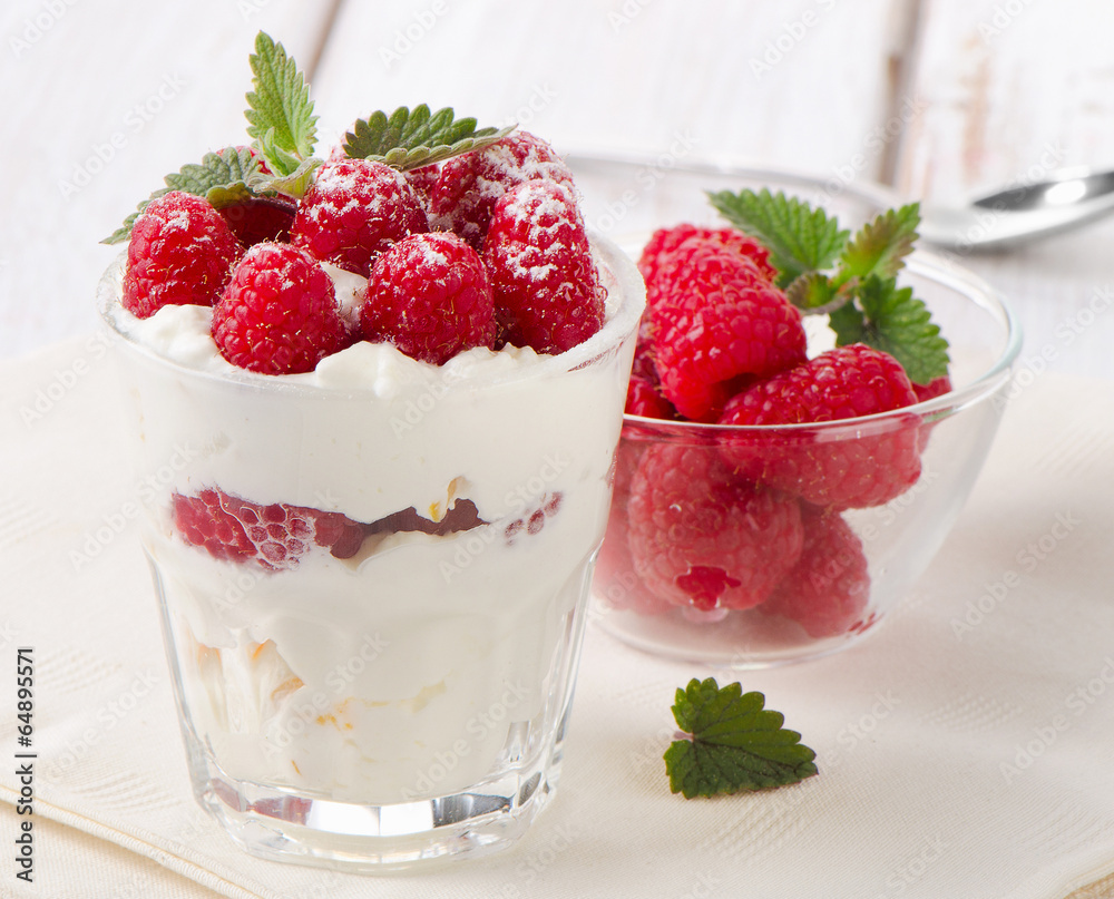 dessert with raspberries and mint leaf dessert with raspberries and mint leaf