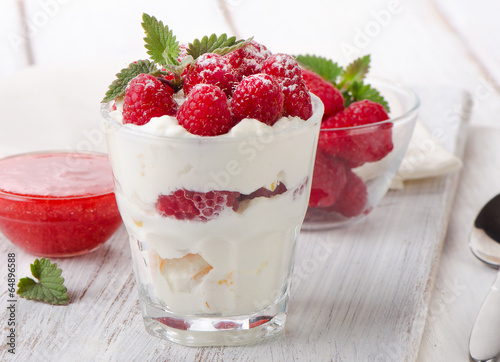 dessert with raspberries and mint leaf