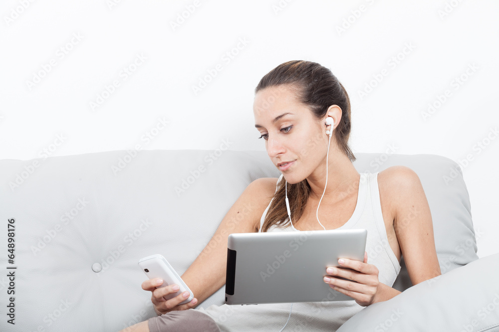 Relaxed woman using digital tablet Relaxed woman using digital tablet