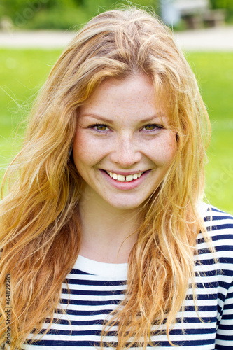 Portrait of a happy young woman photo