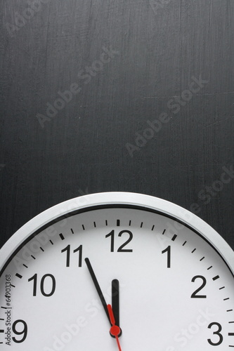 Clock on a Blackboard with copy space