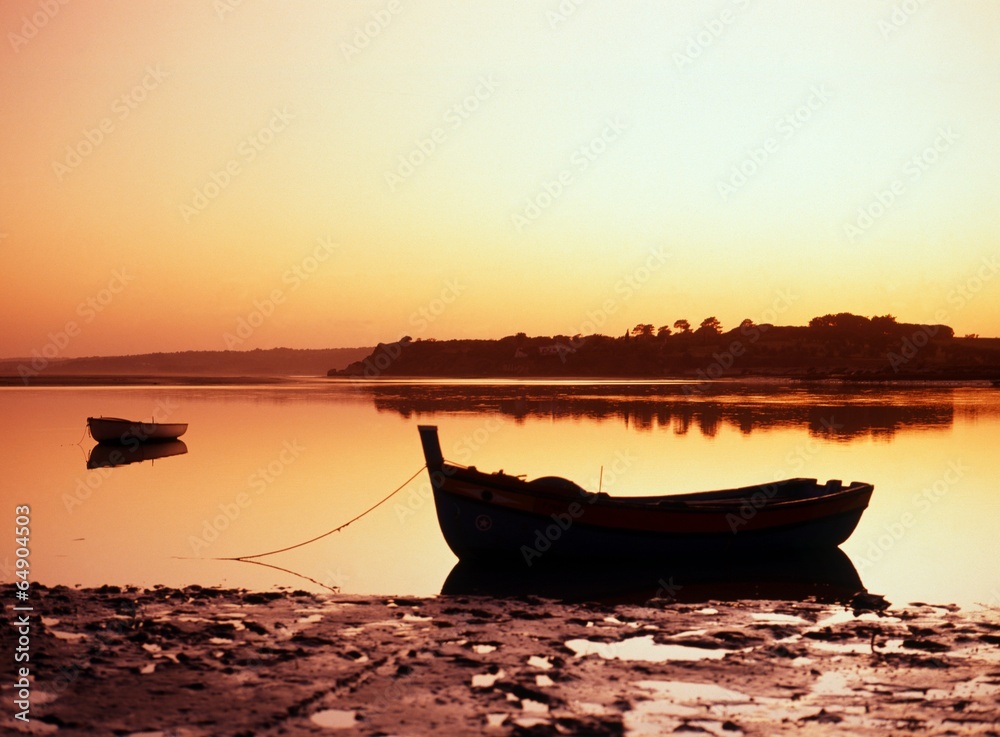 Fishing boat at sunset, Portugal © Arena Photo UK