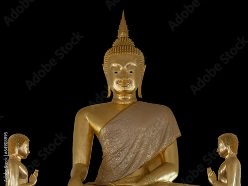 Thai Buddha statue against a black background photo