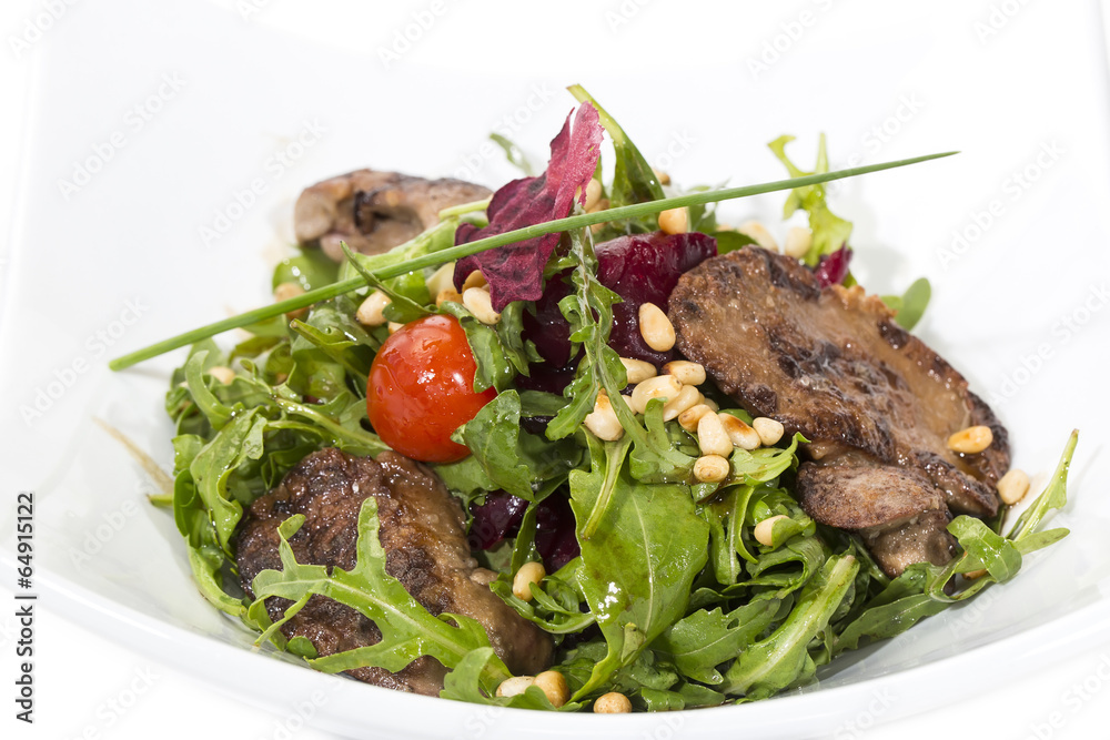 rabbit liver salad with arugula in a restaurant rabbit liver salad with arugula in a restaurant