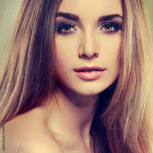 Beautiful  girl, isolated on a light-grey , emotions, cosmetics