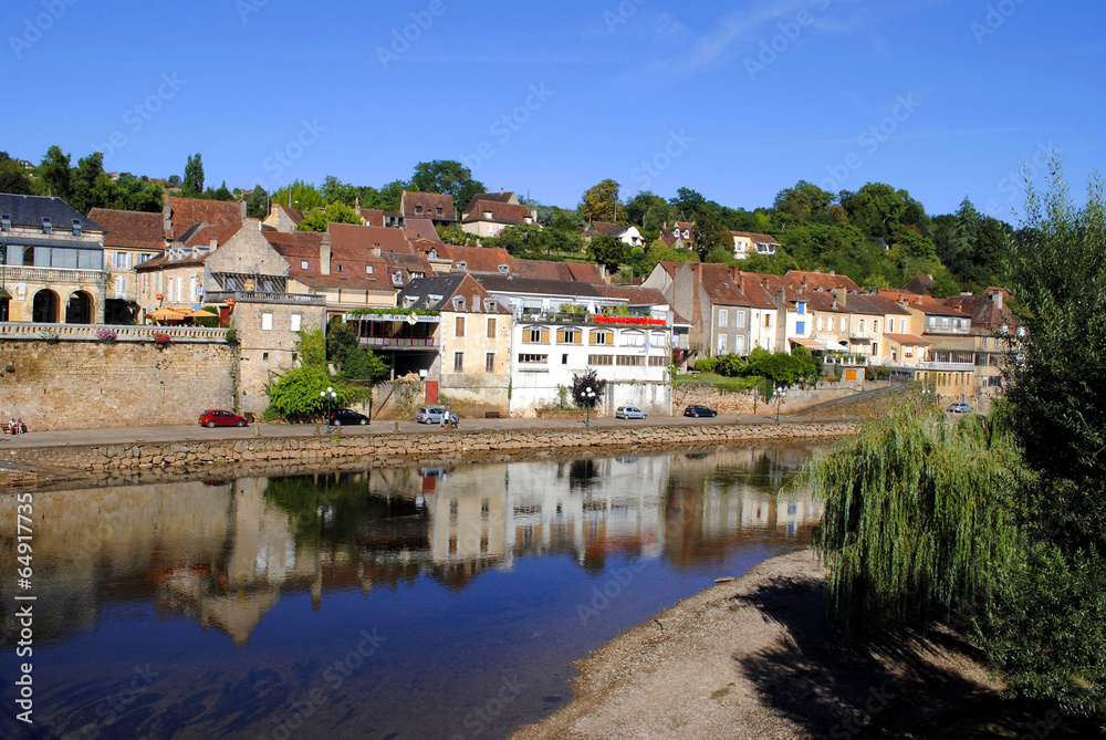River Vezere in the market town of Le Bugue, France