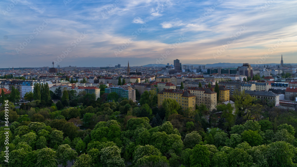 Vienna cityscape at sunset, different ages, styles and colors