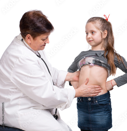 Senior pediatrician examining girl