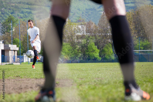 soccer player shooting