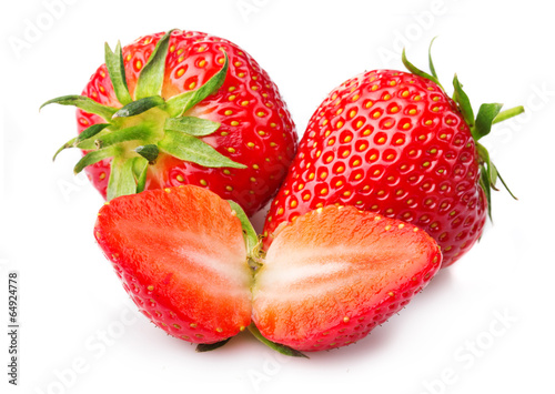 Strawberries with leaves and slices isolated on a white