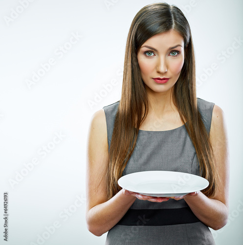 portrait of business woman hold empty white plate.