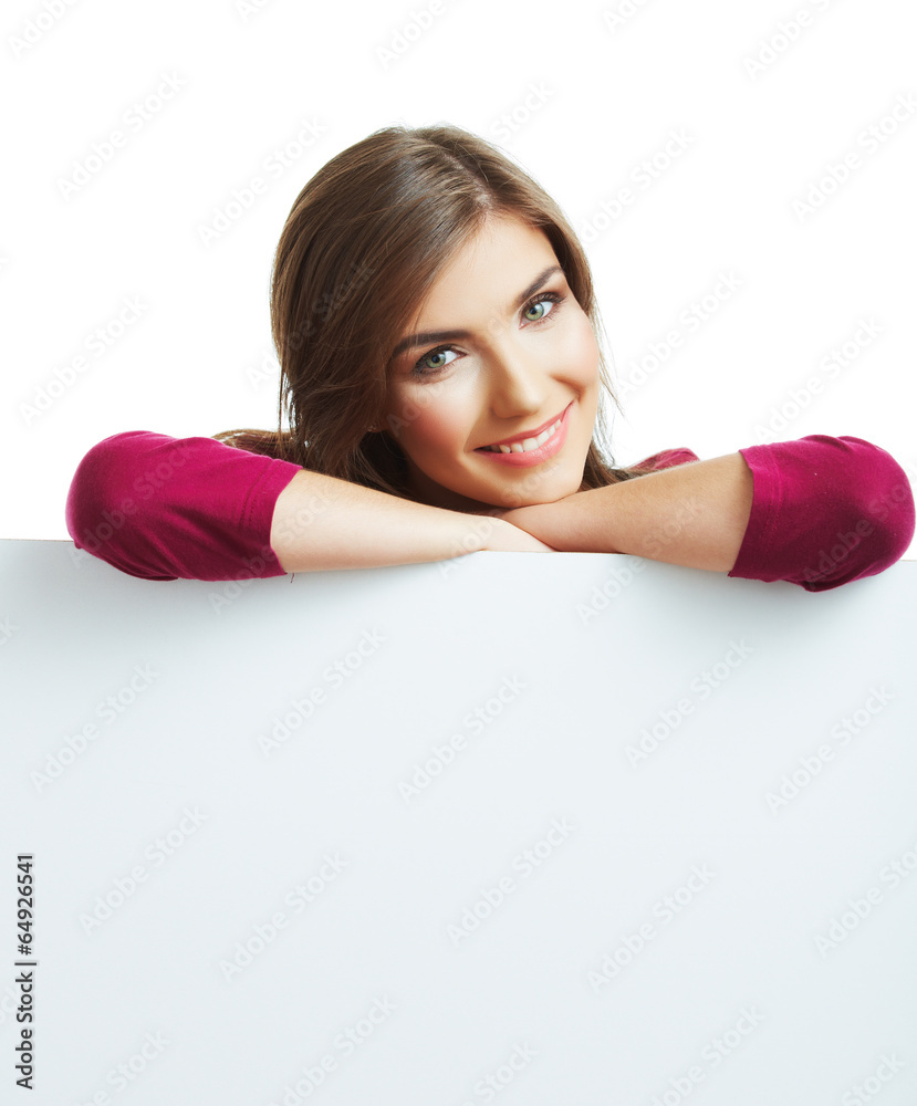 Smiling woman leaning on big blank board . Close up female face Smiling woman leaning on big blank board . Close up female face