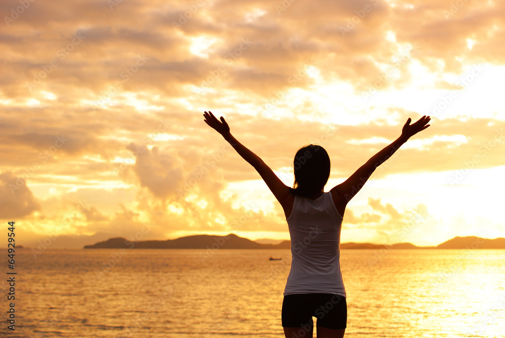 cheering woman open arms at sunrise seaside cheering woman open arms at sunrise seaside