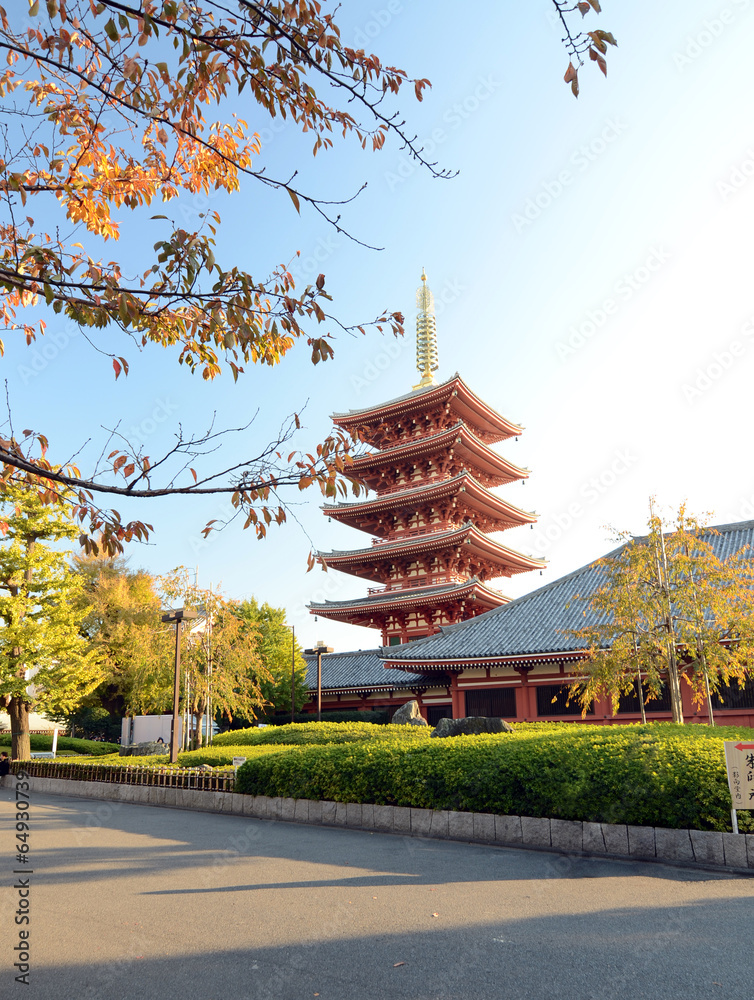 Naklejka premium Ornate five-storey pagoda at Sensoji Temple in Tokyo, Japan.