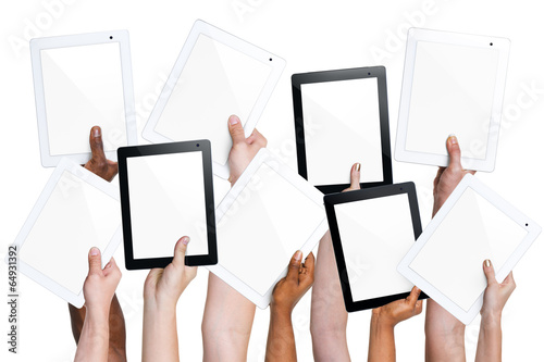 Group of Hands Holding Digital Tablets
