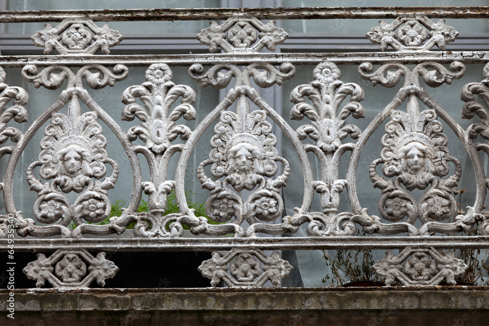 beautifully adorned iron balustrade of the balcony