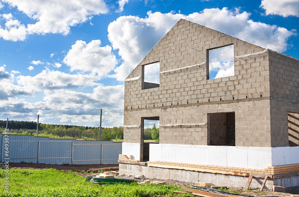 house construction from blocks and bricks