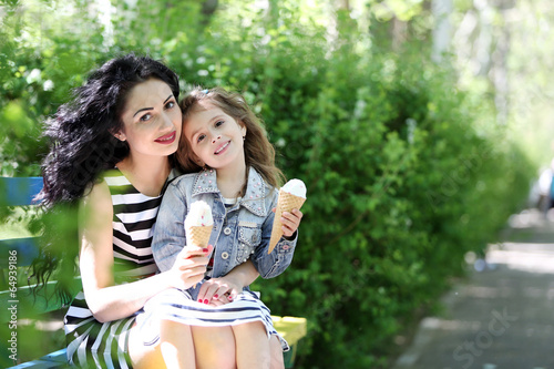 Happy mom and daughter. Wal...