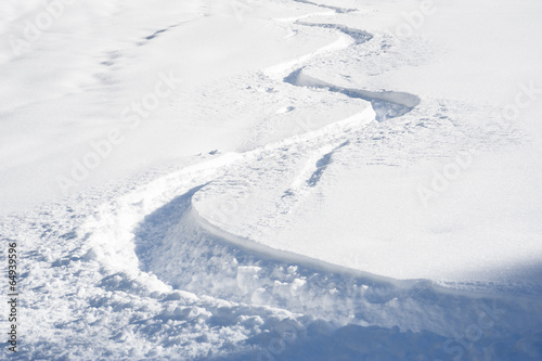 Ski track in fresh snow © jakazvan