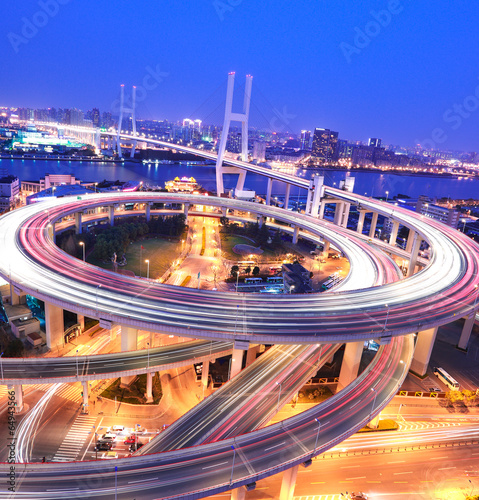 Fototapeta Spiral bridge in Shanghai Huangpu River on the bird's eye view o