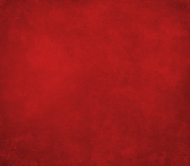 Grunge texture of a dilapidated wall in a red tone