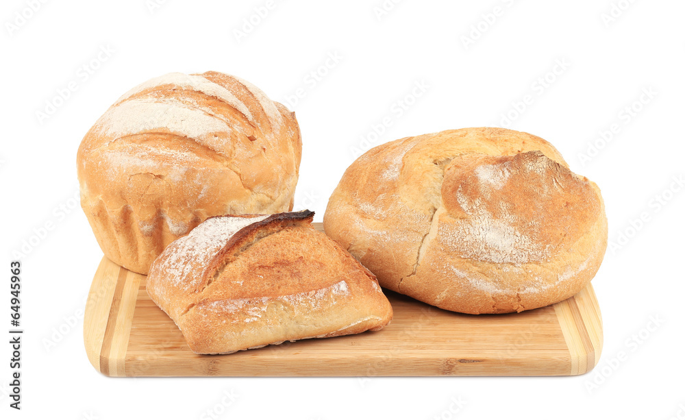Various of bread on cutting board.