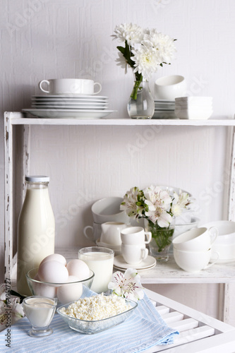 Still life with tasty dairy products on table