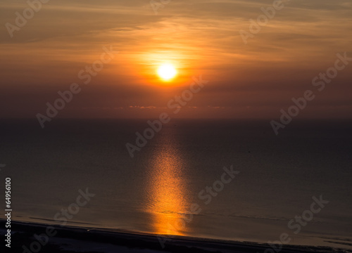 Sunrise with beautiful colors at the sea © domonite