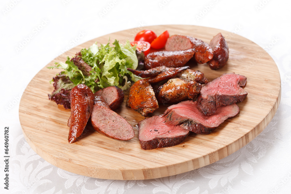 sausages on a wooden cutting board