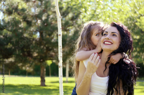 Happy mom and daughter. Wal...