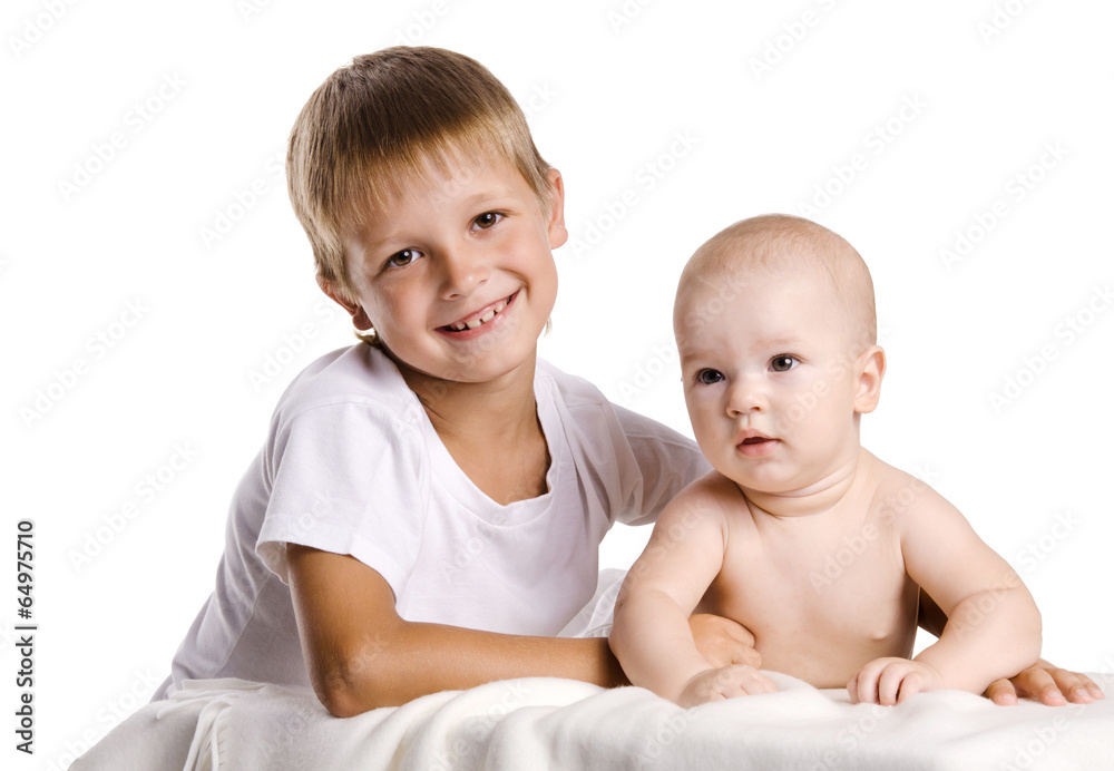 Happy boy hugging his younger brother Happy boy hugging his younger brother