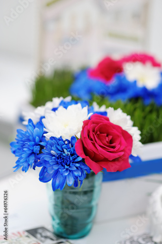 Bright bouquet on glass vase