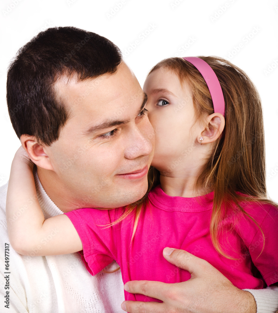 Little girl telling something her smiling father isolated