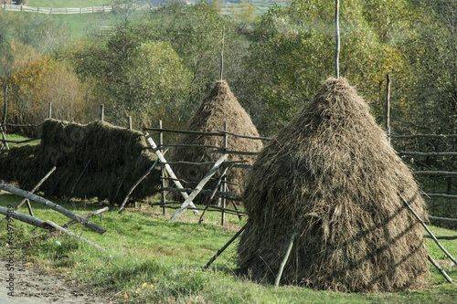 Valokuvatapetti haystacks in the country