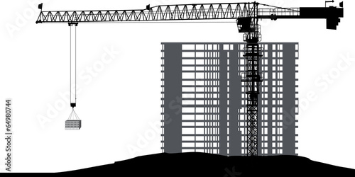 single large crane and unfinished house