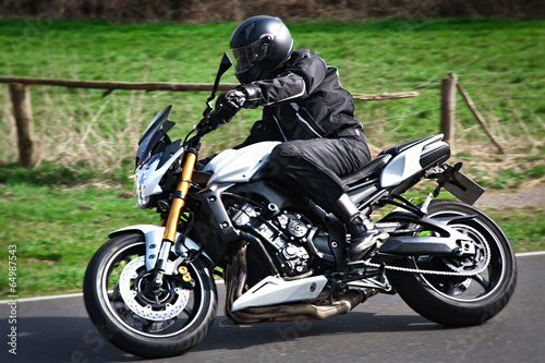 Motorcyclist biker on the road