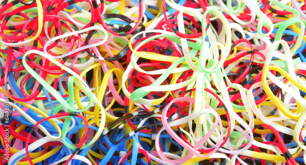 Set of multi-coloured elastic bands close up
