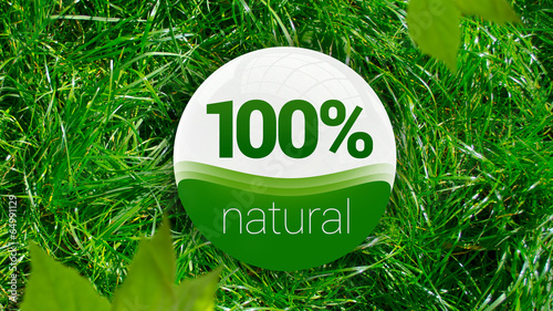 100% natural icon concept on the green grass