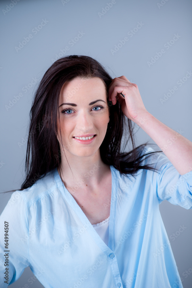 Isolated studio portrait of cheerful young woman Isolated studio portrait of cheerful young woman