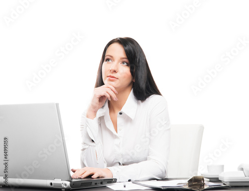 Attractive business woman working in office isolated on white