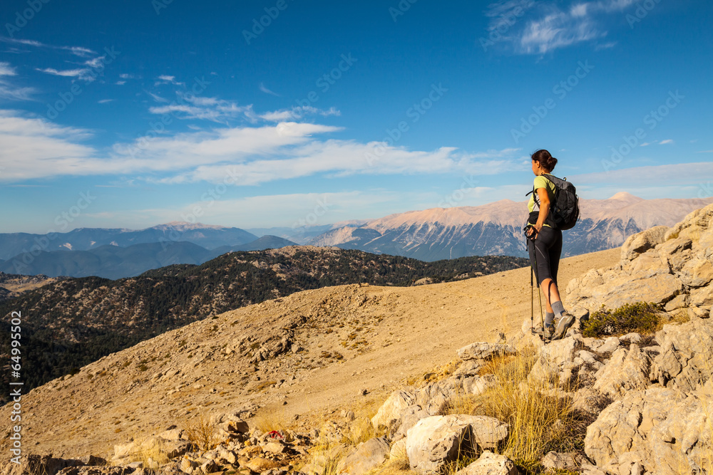 tourist woman on the top of mount,