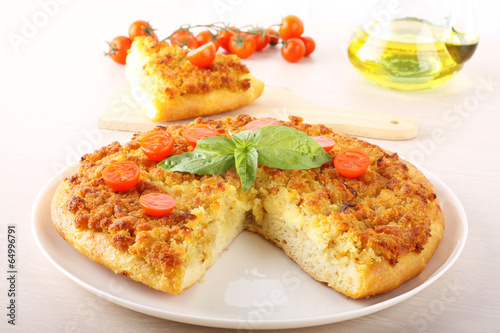 Pizza with breadcrumbs  onion and tomatoes