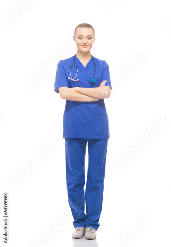 Young, professional and cheerful female doctor isolated on white