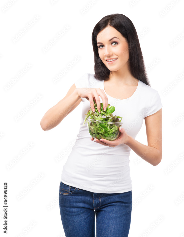 Healthy teenage girl with a bowl of green salad Healthy teenage girl with a bowl of green salad
