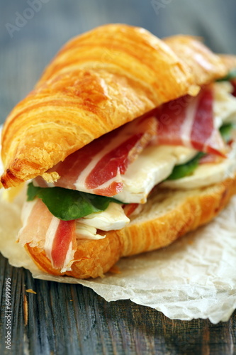 Sandwich with ham and cheese close up.