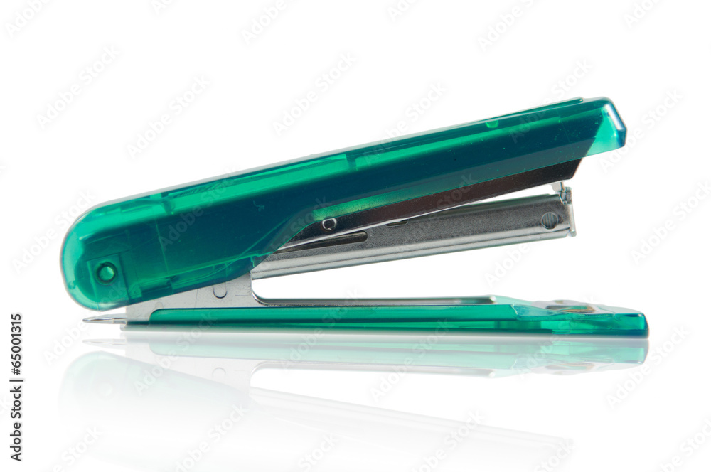Green staple and shadow effect on white background Green staple and shadow effect on white background