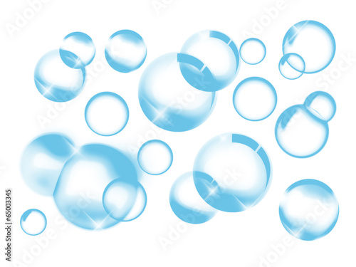 bright blue soap bubbles on white background