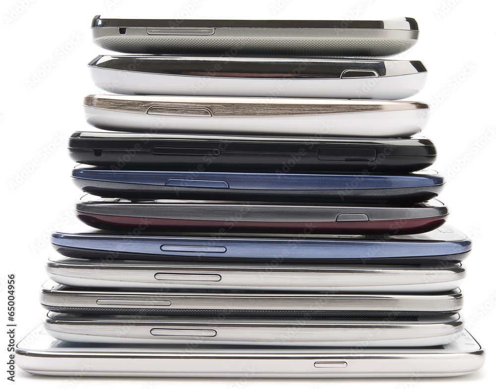 Bunch of old mobile phones isolated on white background Bunch of old mobile phones isolated on white background